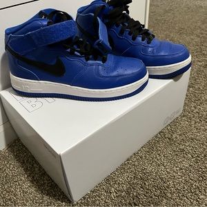 Size 9.5 Nike high tops.